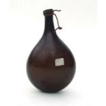 A 17th century German bottle or flask of compressed circular form, with Richard Temple collector's