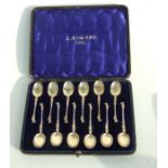 A set of twelve cased silver gilt teaspoons, Birmingham 1892, weight 83g.