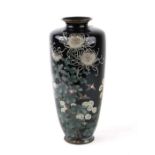 A Japanese silver wire cloisonné vase decorated with chrysanthemums and birds on a black ground,