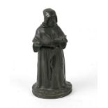 A French bronze go-to-bed model of a monk with match strike to base, 14cms high.Condition