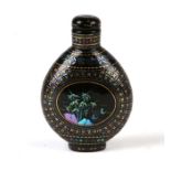 A Chinese lacquer Burgaute snuff bottle finely inlaid with mother of pearl and piquet decoration and