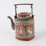 A Chinese, for the Thai market, Bencharong teapot and cover decorated with mythical figures, 22cms