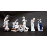 A group of Lladro figures to include a girl feeding a goose, a girl holding a baby and two