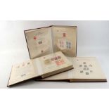 Three albums containing Red Cross stamps and covers to include First World War and World interest (