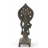 A small bronze temple figure. 11cm high