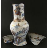 A Chinese Kangxi period (1661-1722) blue & white yen yen vase decorated with figures and warriors