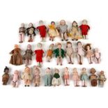 A large collection of late Victorian and Art Deco bisque jointed miniature dolls of boys and girls.