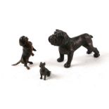 Three Franz Bergman style cold painted figures, a bull dog, 8cms long; and two smaller figures of