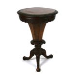 A Victorian burr walnut trumpet work box, the circular top with a carved frieze, on a tripod base
