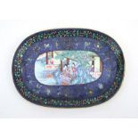 A Chinese Canton enamel oval tray decorated with figures on a terrace, on a blue ground within a