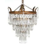 A four-tier crystal drop chandelier, 28cms diameter.