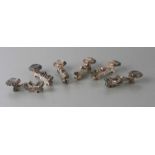 A set of six silver plated knife rests in the form of dragons, each 9cms long (6).