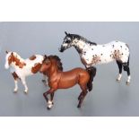 Eight Beswick horses comprising Grazing Shire, brown 1055; Shire Foal, large brown 951; Arab Foal,