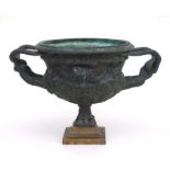 After the antique. A bronze Warwick vase of typical form decorated with classical figures, on a