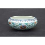 A Chinese famille rose Ducai style brush washer with six character blue mark to the underside, 14cms