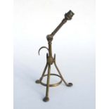 An early 20th century WAS Benson style brass adjustable Pullman lamp, 36cms high.