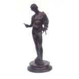 An Italian patinated bronze figure of Dionysus wirth an animal skin over his left shoulder, 38cms