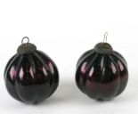 Two large Victorian style amethyst glass Christmas tree baubles, 11cms high (2).Condition Reportupon