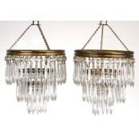 A pair of three-tier crystal drop chandeliers, 22cms diameter (2).