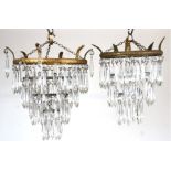Two chandeliers with prismatic glass drops (2).Condition ReportOne measures 20cms wide and the other