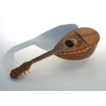 An Italian rosewood mandolin, bears paper label - Il Globo - 60cms long