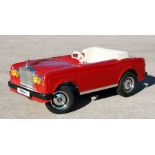 A Tri-ang Sharna Rolls-Royce Corniche child's battery operated pedal car complete with batteries and