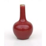A Chinese sang de boeuf bottle vase, 18cms high.Condition ReportNibbling to base, otherwise good