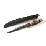 A sheath knife with antler handle and leather sheath, 26cms long.