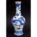 A large Chinese blue & white vase decorated with dragons amongst clouds, 44cms high.Condition