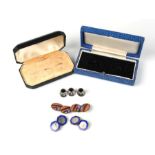 A pair of silver and enamel cufflinks; together with a pair of Art Deco design cufflinks; and a