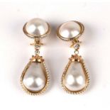 A pair of 18ct gold diamond set baroque pearl drop clip earrings, 5cms drop, total weight 26.2g.