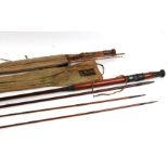 A Hardy Bros three-piece Greenheart fly fishing rod with spare tip; together with a similar J Peek &