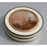 An 18th century ivory and tortoiseshell snuff box of compressed circular form, the top with a