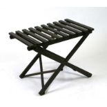 A Haxyes folding luggage rack, 66cms wide.