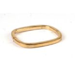 A 9ct gold square form bangle, 12.1g.