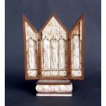 An 18th / 19th century Italian carved bone triptych, the central panel depicting Christ and the