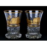 A pair of 19th century German marriage beakers, the flared bowls on heavy cut glass bases with