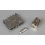 A Middle Eastern white metal pouch, 9cms high; together with a Chinese silver coloured snuff bottle;