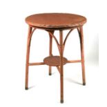 A Lloyd Loom style two-tier circular occasional table, 57cms wide.