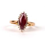 A yellow metal (test as high carat) Ruby and diamond ring of navette form, approx. UK size S. 5.6g