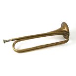 A WWI Boosey & Co. brass military bugle, stamped 1916, 42cms long.