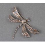 A white metal with yellow metal opal set dragonfly brooch. 6.5cm wide. 10.8g