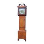 A longcase clock, the 30cm square brass dial with silvered chapter ring and Roman numerals,