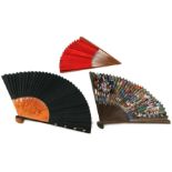 A Chinese fan, the leaf with painted decoration depicting figures; together with two similar fans (