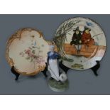 A Royal Worcester blush ivory and gilt shaped dish decorated with a floral spray, 22cms diameter;