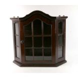 A continental mahogany wall hanging display cabinet, 58cms wide.