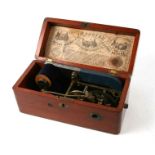 A late 19th / early 20th century Magneto Electric Machine for Nervous Diseases, in a mahogany