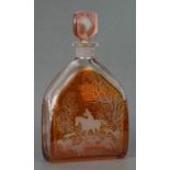 An Orrefors amber flashed glass decanter with etched hunting scenes, base signed 'Zaglo H101/102a UK