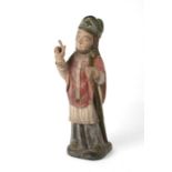 A painted carved wooden figure of a saint, 45cms high.Condition ReportGood overall condition and