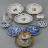 Three Meissen ribbon tie plates decorated with fruit, 15cms diameter; together with other